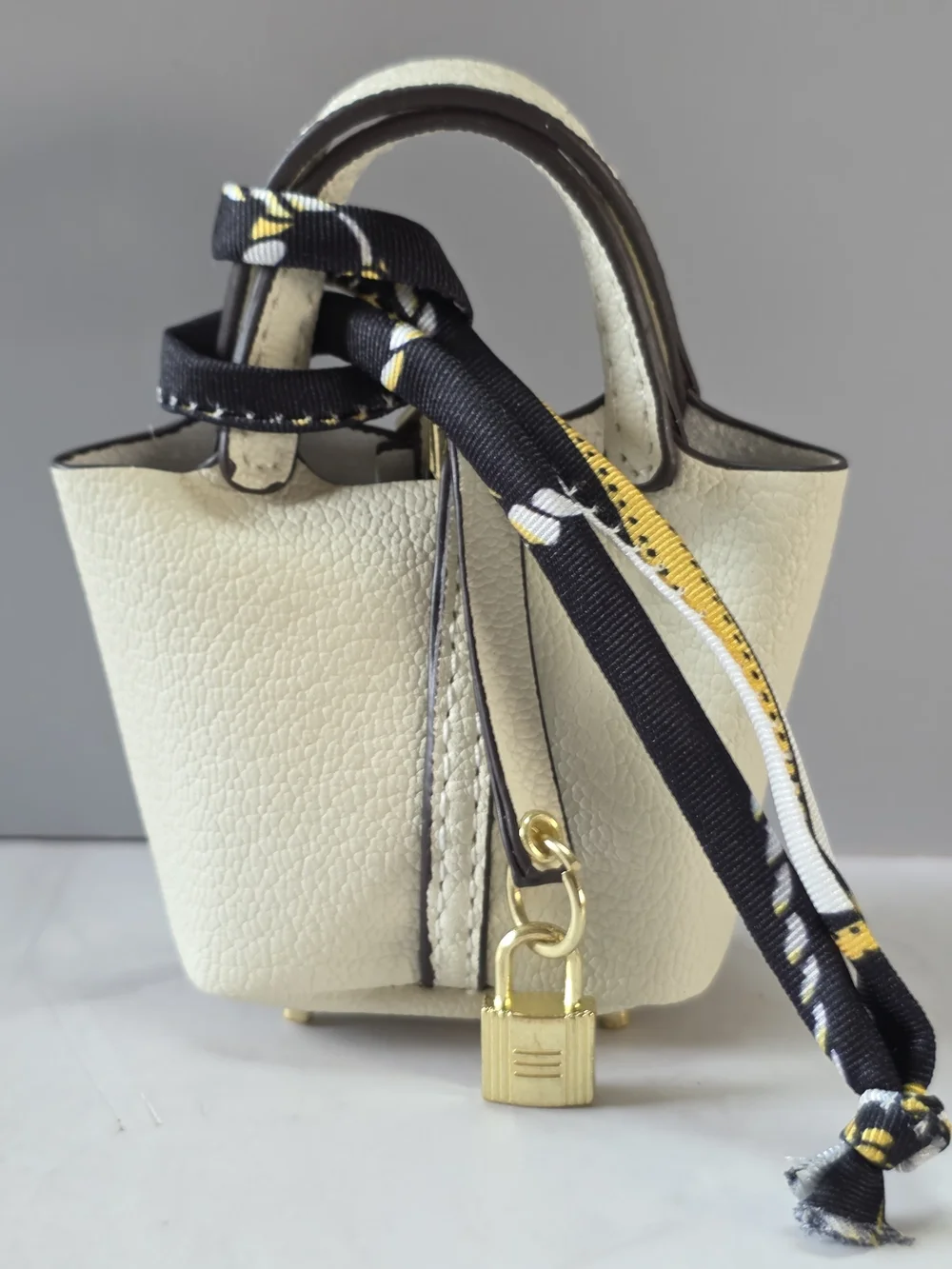 Cream Mini Leather Tote with Gold Padlock and Black Scarf Accent - Picture 1 of 3